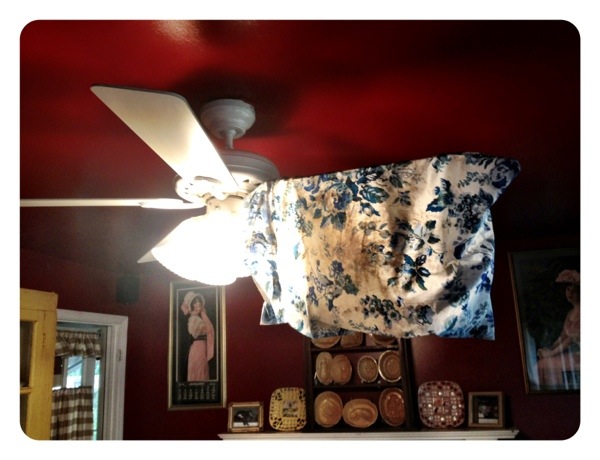 Use an old pillowcase to clean your ceiling fan blades!  No more dust bunnies flying everywhere!