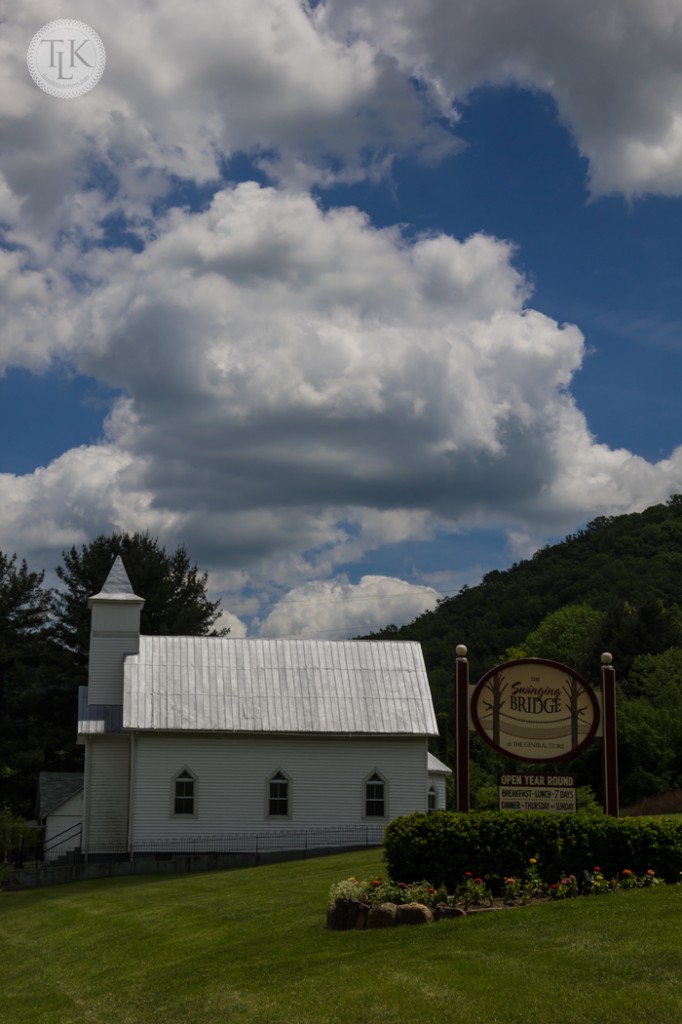 Humphreys Chapel United Methodist Church in Paint Bank, Virginia with the Swinging Bridge Restaurant Sign