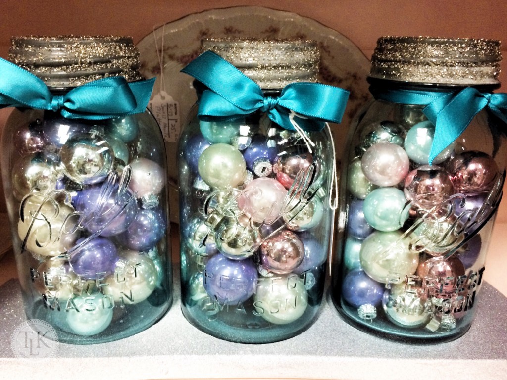 Colorful Glass Ornaments fill old Mason Jars on threelittlekittens.com/blog